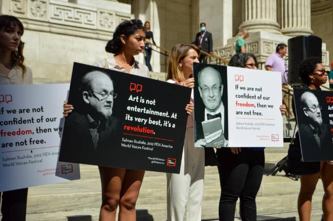 Signs for Rushdie. Photo: Abigail Gruskin