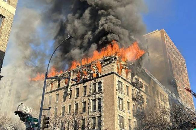 An apartment building on the corner of 107th St and Amsterdam Ave. was set ablaze in the morning of December 9, 2025. After receiving the alarm, James Lafferty and his ladder company quickly responded and rescued occupants on the scene. (Credit: FDNY)