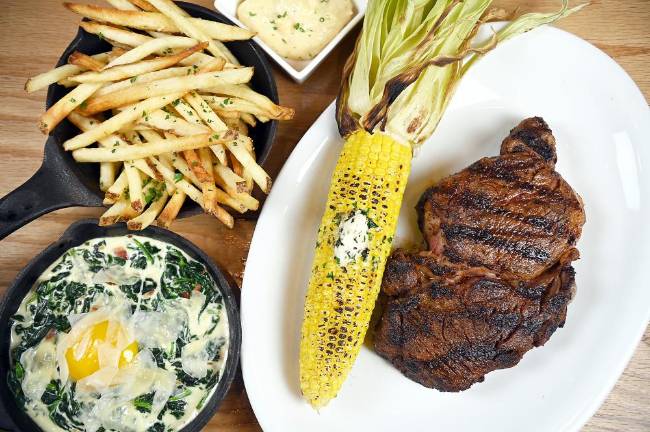 Vinyl Steakhouse Filet &amp; Asparagus, Ribeye &amp; Corn, Porterhouse &amp; Fries. Photo: MST Creative