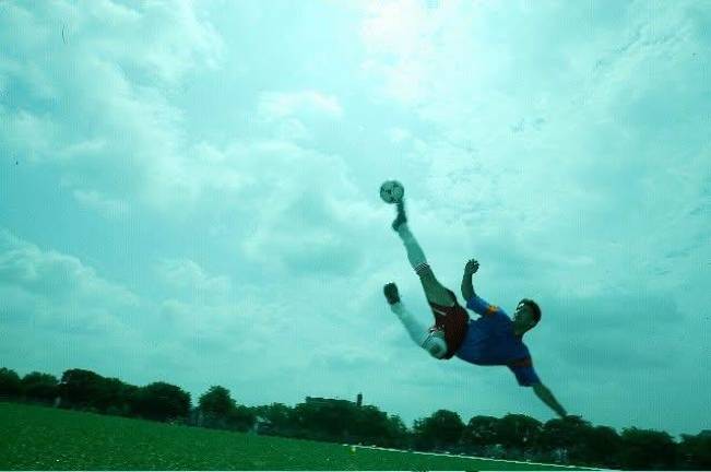 Saunier performing a bicycle kick