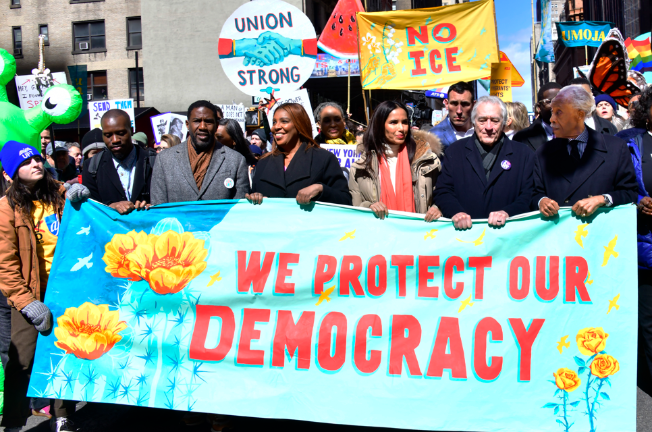 Political leaders such as NYS Attorney General Letitia James (front row, fourth from left) were joined by actor Robert DeNiro (second from right) and the Rev. Al Sharpton (far right) at the demonstration on March 28.