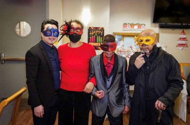 Christmas masquerade party at VillageCare at 46 &amp; Ten.