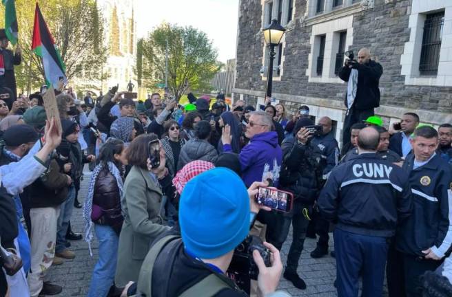Pro-Palestinian protesters at City College with CUNY police, April 25, 2024. Photo: Gabriel Poblete/THE CITY