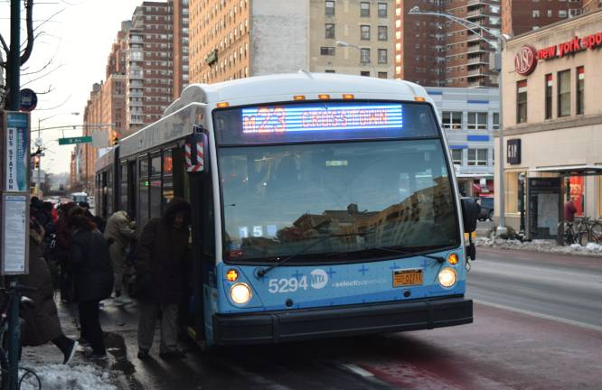 With the introduction this week of fines for illegal use of newly installed bus lanes on 23rd Street, city officials hope to speed the corridor's Select Bus Service. Photo: Michael Garofalo