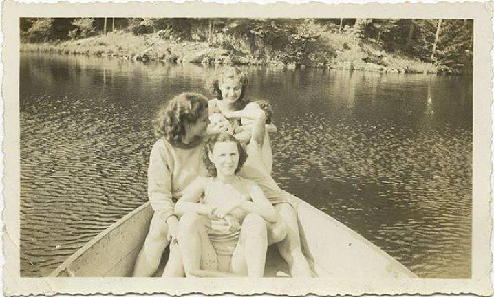Teen girls in a rowboat at summer camp. Photo: Wikipedia Commonss, Digitized by the Gruss Lipper Digital Laboratory at the Center for Jewish History