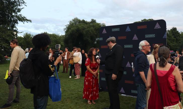 Director Penny Lane talks to press before the screening.
