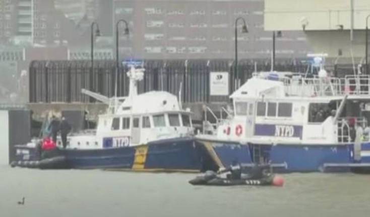 Wreckage of the helicopter that crashed into the Hudson on April 10, killing a family of five and the pilot.