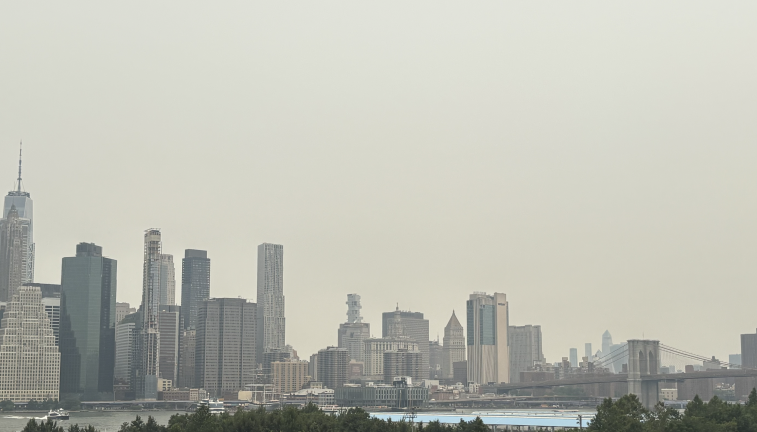 July 16 haze on looking over the Brooklyn Bridge into Manhattan.