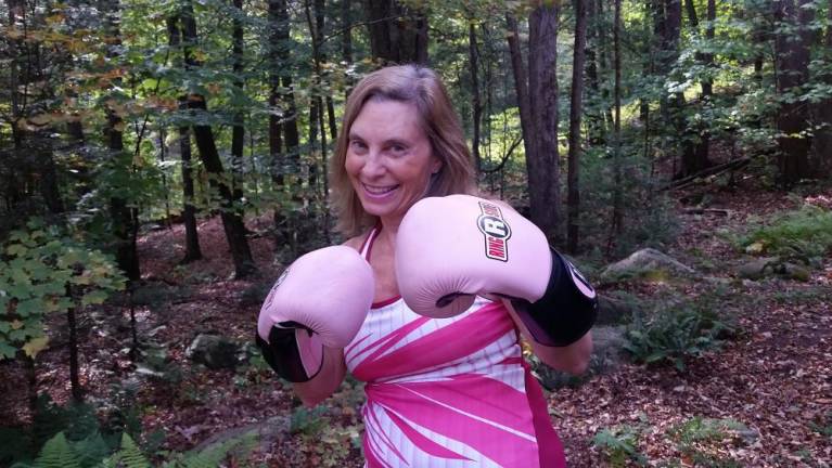 The author boxing during her 10th “Cancerversary” in 2017. Photo courtesy of Bethany Kandel
