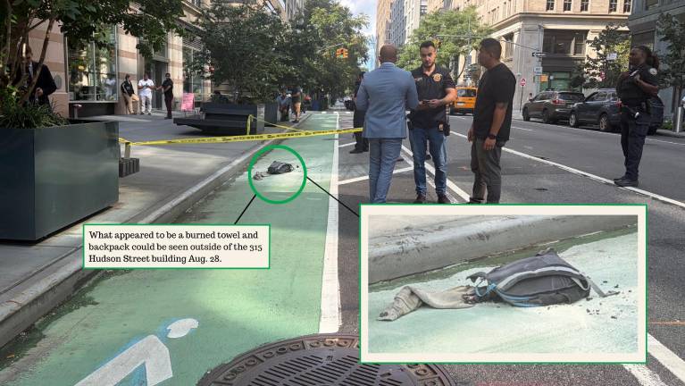 What appeared to be a burned towel and backpack could be seen outside of the 315 Hudson Street building Aug. 28.