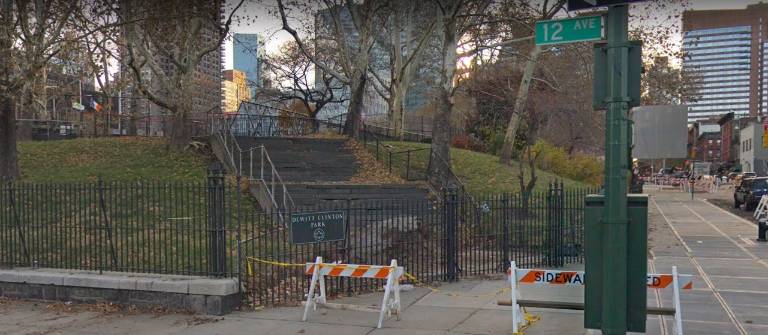 The entryway to DeWitt Clinton Park at 12th Avenue and 52nd Street has been fenced off for years because of a pair of dilapidated and inaccessible stairways. Photo: Google Street View