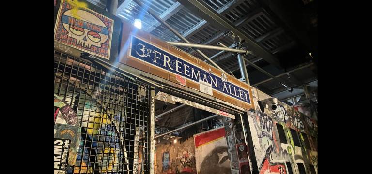 3 Freeman Alley is the entrance to Untitled, a boutique minimalist hotel with a rooftop bar.
