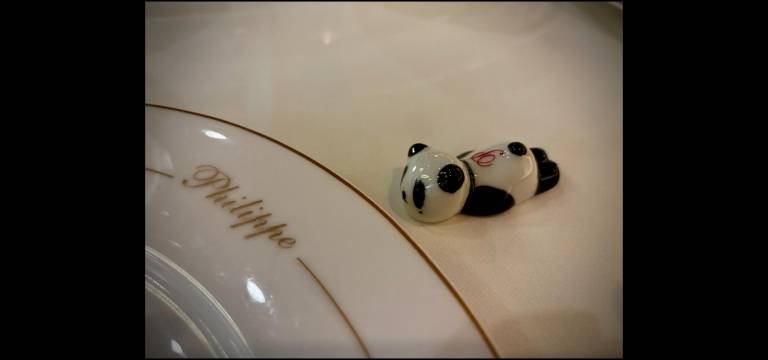 Philippe Chow’s playful pandas adorn every table.