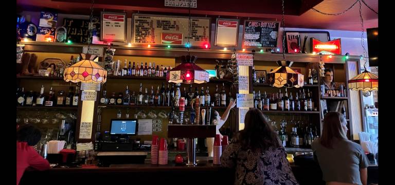 Belly up to the bar, and Pearl will show you the drink specials.
