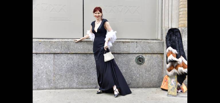 Art Deco geometric motifs and shoes to match. Karen’s style notes: “I simply adore this gown by <a rel=nofollow noopener noreferrer href=https://engineeredbyandreat.com/ target=_blank>Andrea T New York</a>. It perfectly captures the elegance of 1920s fashion. Together, the exquisite natural silk jersey and silk-satin drape gorgeously to reveal the Art Deco geometric panels in her design. Many thanks also to Gabija Guzauskaite for her <a rel=nofollow noopener noreferrer href=https://www.youtube.com/watch?feature=shared&amp;v=A9hKdCq4Ac0 target=_blank>easy 1920s makeup tutorial</a>.
