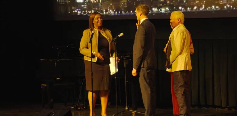 New York State Attorney General Letitia James administering the oath of office to State Senator Erik Bottcher at the AMNH.