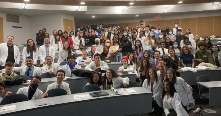 Class photo: High school students with their medical student mentors after ceremonies. Photo: Barbara Franklin