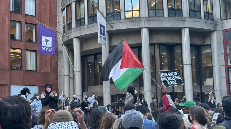 Pro-Palestine NYU students and faculty on April 22 protest and demand NYU divest from holdings in Israel.