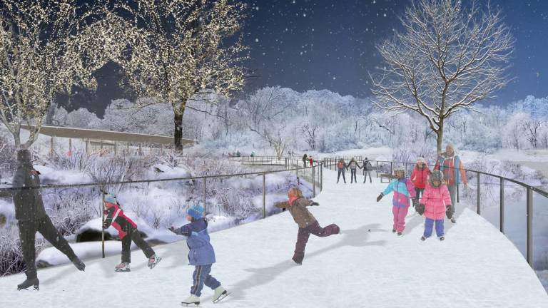 A wintertime view of the boardwalk, converted into a planned skating ribbon that will run along the edge of the Harlem Meer in Central Park.