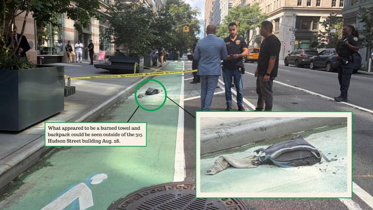 What appeared to be a burned towel and backpack could be seen outside of the 315 Hudson Street building Aug. 28.
