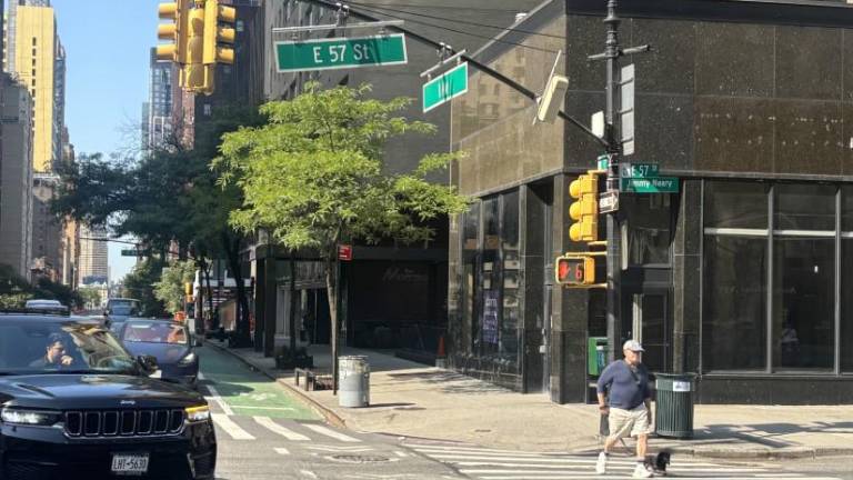 The intersection where police say a 25-yearold driver delivering goods in an Amazon e-van mowed down a 79-year-old pedestrian fter exchanging words.