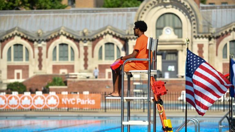 A lifeguard monitors the Hamilton Fish Pool on the Lower East Side amid nationwide staffing shortages. Photo: NYC Parks / Daniel Avila