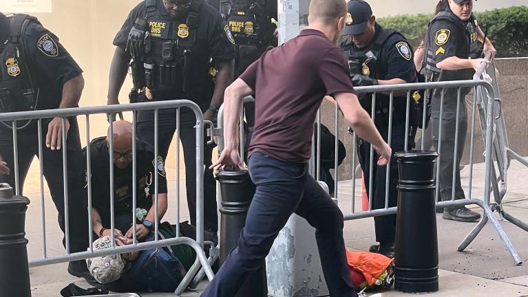 Law enforcement tackled Andrew Arrabaca to the ground after receiving 911 calls about fireworks and what some callers thought was an active shooter.