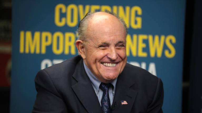 Former Mayor Rudy Giuliani speaking with the media at the 2019 Student Action Summit hosted by Turning Point USA at the Palm Beach County Convention Center in West Palm Beach, Florida