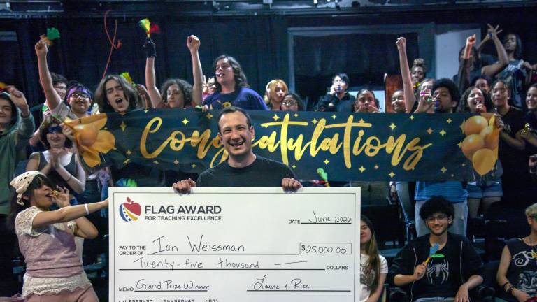 Ian Weissman, a social studies teacher at Repertory Company High School for Theatre Arts, receives the FLAG Award for Teaching Excellence. Beginning June 8, six exceptional New York City public school teachers received surprise $25,000 checks for winning FLAG Awards for Teaching Excellence.
