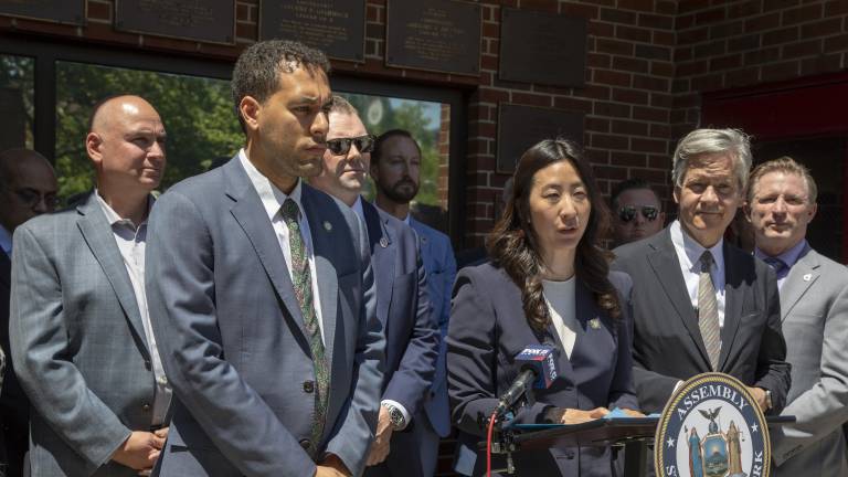 Assembly Member Grace Lee speaking at a press conference announcing $2 million from state budget to support health research for first responders following exposure to 9/11-related diseases. Pictured are also Manhattan Borough President Brad Hoylman-Sigal, Dr. Amit Verma, Dr. David Prezant, Tammy Meltzer, and Jim Brosi.