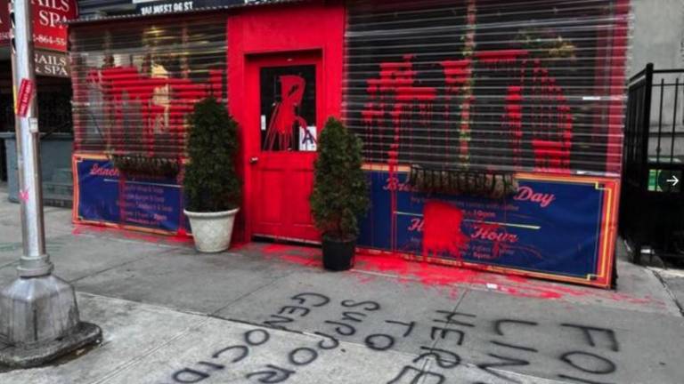 The outside of popular Jewish owned, Effy’s Cafe, located at 104 W 96th street in the Upper West Side, vandalized by fake blood over the restaurant shed and anti-semitic hate crime written on the concrete with black graffiti paint saying “Form line here to support genocide” on March 18. Photo Credit:<a rel=nofollow href=https://twitter.com/MarkSvensson/status/1769841188150865942> Twitter of Mark Svensson</a>, attorney.