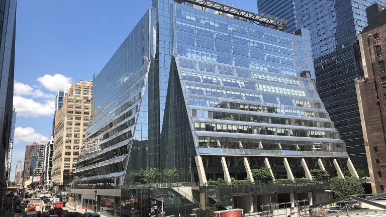 An armed carjacker reportedly commandeered a yellow taxicab outside of 450 W. 33rd St. (pictured above) on Sunday, Mar. 22, cops say. He crashed it three miles south, near Canal St. and Lafayette St.