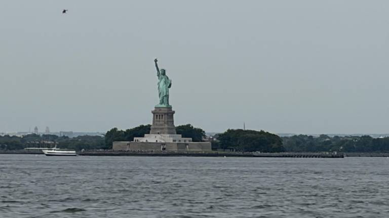 A boat that capsized in the New York Harbor near Liberty Island on Aug. 8 killed a mother and her baby. Here, Liberty Island is seen from Valentino Pier, Red Hook, Brooklyn, on the morning of Aug. 10.