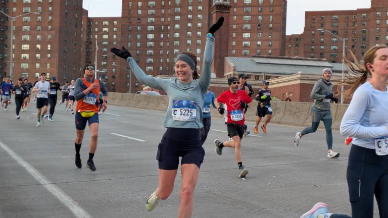 The joy of running past Stuy Town in the NYC Half Marathon.