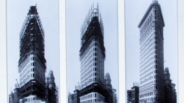 The Flatiron Building’s original construction, with the visible steel frame structure which stabilized the building’s triangular shape.