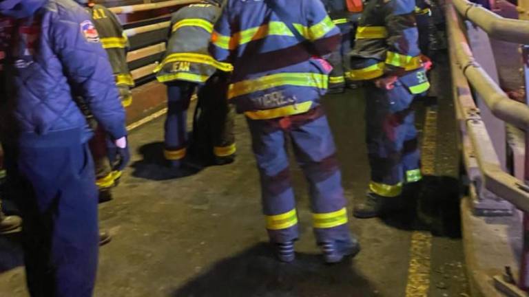 Firefighters on the Ed Koch Queensboro Bridge on the night of Feb. 16 when a 16 year old boy was pulled from a 50 ft maintenance shaft and transported to a local hospital in critical but stable condition.