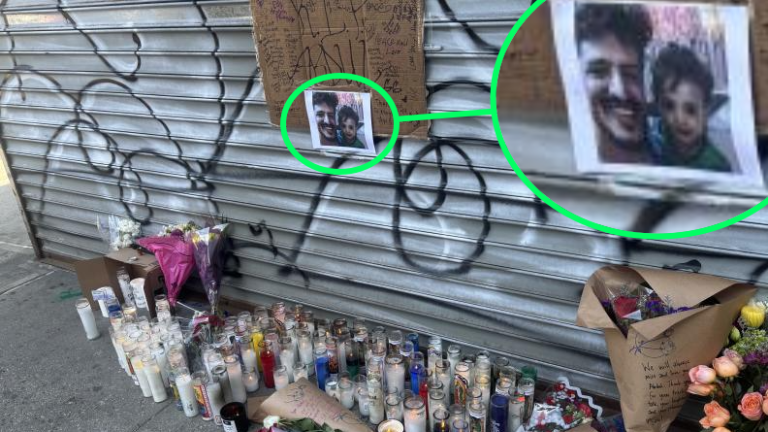Candles, flowers and a handwritten sign at the makeshift memorial outside Sal’s Deli and Grocery were Abdul Saleh was killed on the night of April 25. The photo shows him with his young son.