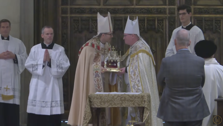 Archbishop Ronald Hicks received the remains of the late Archbishop Fulton J. Sheen at St. Patrick’s Cathedral following a recent event in Peoria, IL where the late archbishop was elevated to “blessed” status.