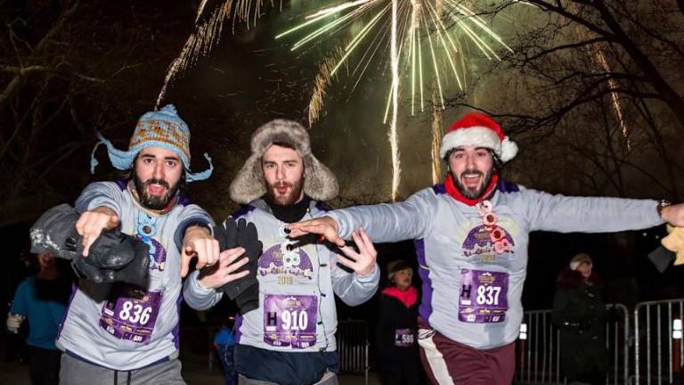 Fireworks and costumes marked the four-mile New York Road Runners’ annual Midnight Run in Central Park that began counting down at 11:59 p.m. on Dec. 31 and went off precisely at the stroke of midnight.